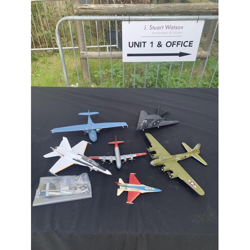 936 - Five metal aeroplane models and one other