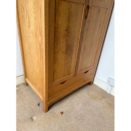 110 - A pair of light oak double wardrobes with drawer (currently dismantled)