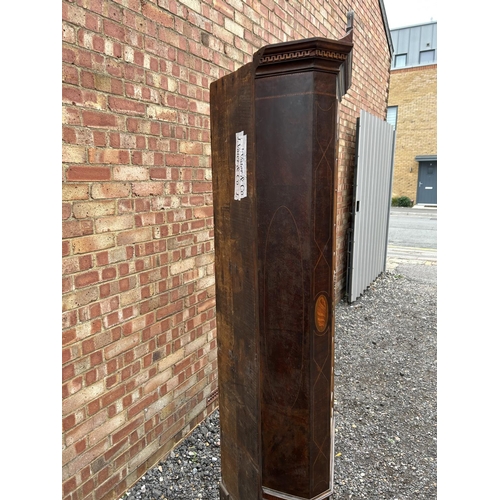 213 - An Irish George III and later mahogany standing corner cupboard