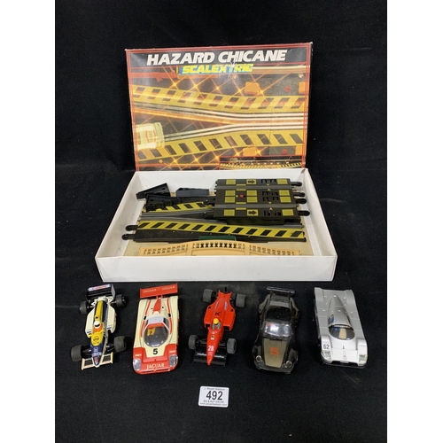 492 - Five Scalextric cars and Hazard Chicane set