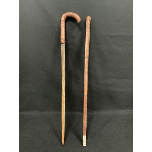 554 - Leather covered sword stick, 86cms long