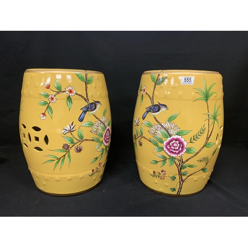 555 - Pair of yellow and bird pattern Chinese garden seats, height 45cms