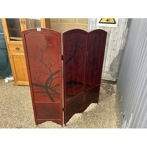 11 - A four section oriental laquered screen 137cm tall