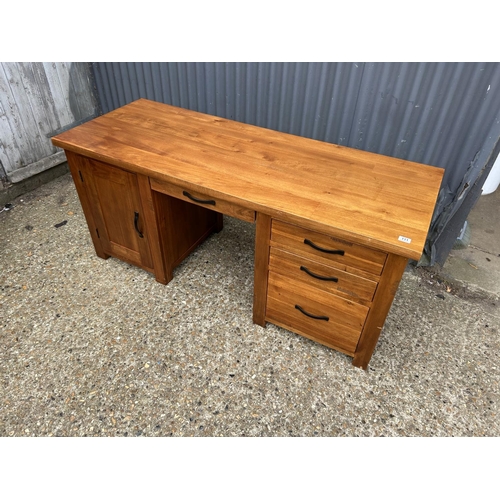 111 - A large modern hardwood desk 165x 65x77