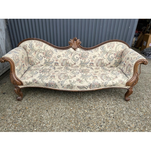 125 - A Victorian mahogany chaise lounge 215 cm