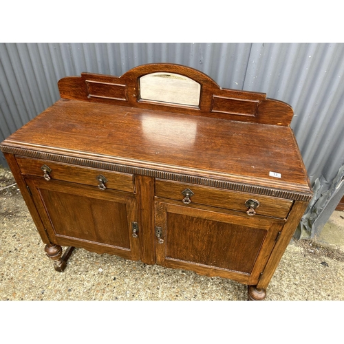 13 - An early 20th century oak sideboard 120cm wide