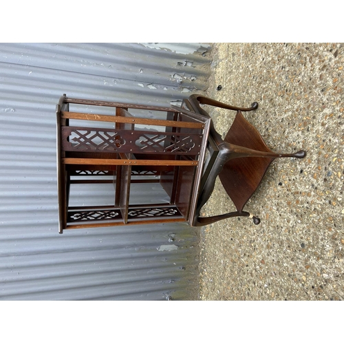 132 - An ornate mahogany revolving bookcase