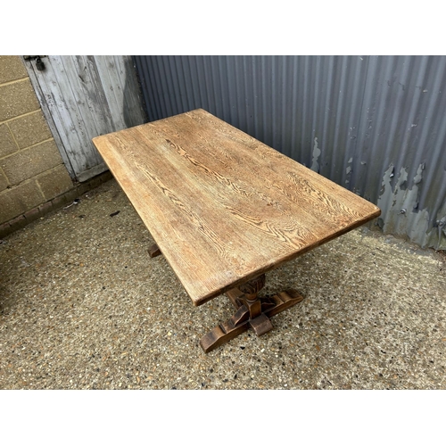 137 - An oak refectory dining table 150x76x77