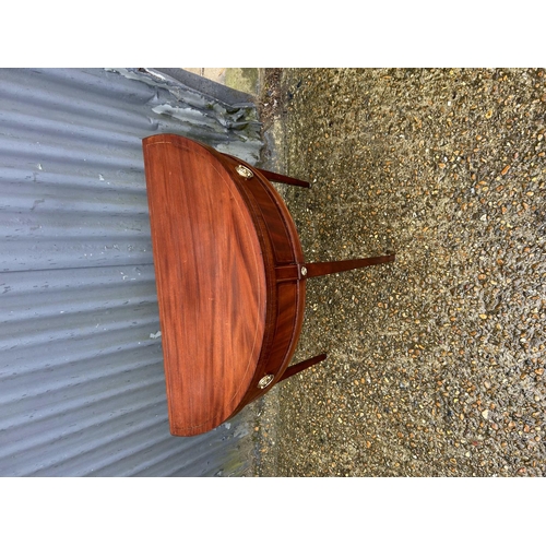 157 - A VICTORIAN MAHOGANY DEMI LUNE FOLD OVER TEA TABLE