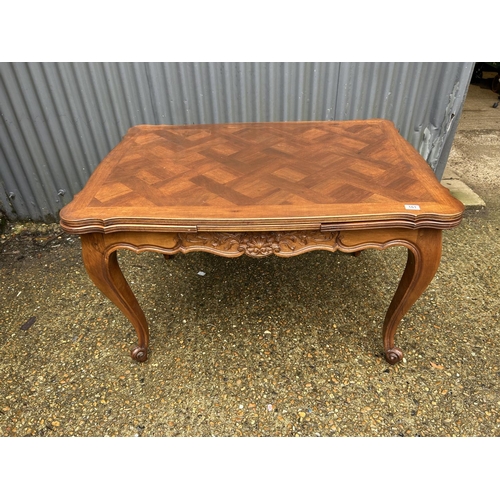 161 - A french drawer leaf dining table with parquetry top 118x83 cm