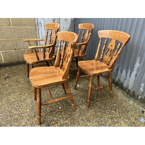 171 - A set of four pine kitchen chairs (2 carvers)