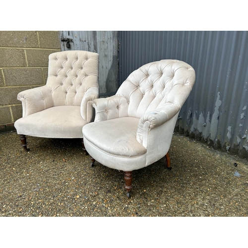 175 - Two Edwardian nursing chairs upholstered in cream