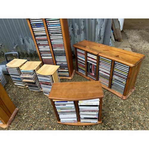 181 - A QUANTITY OF CD RACKS AND CDS