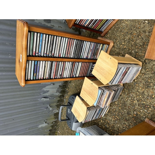 181 - A QUANTITY OF CD RACKS AND CDS