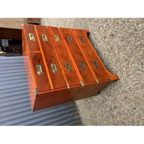 19 - A reproduction yew military style secretaire chest with fitted interior, leather surface  and concea... 