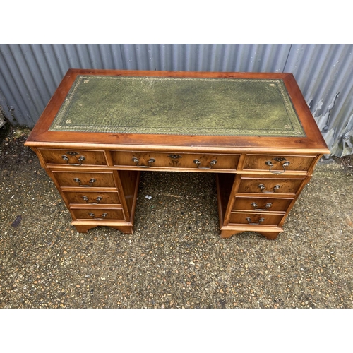 192 - A reproduction yew wood twin pedestal desk