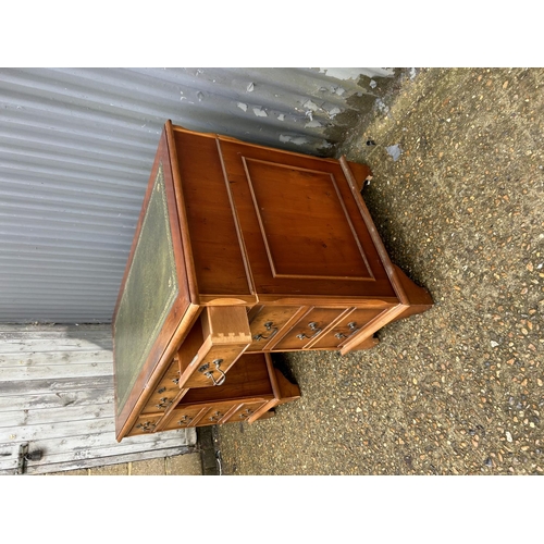 192 - A reproduction yew wood twin pedestal desk