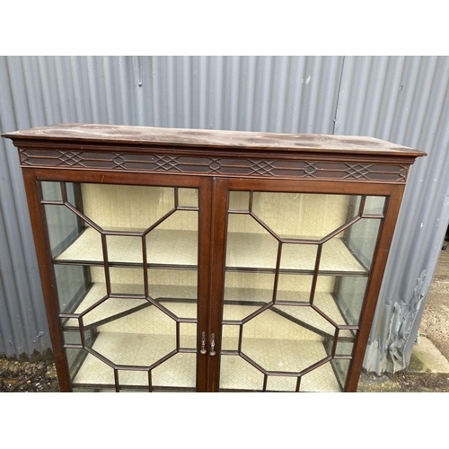 203 - A Victorian mahogany display cabinet  115x40x156