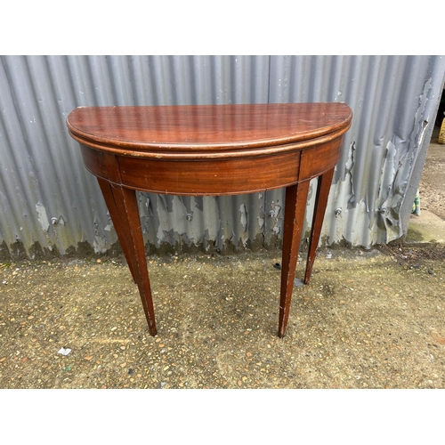 204 - A victorian Demi lune fold over tea table