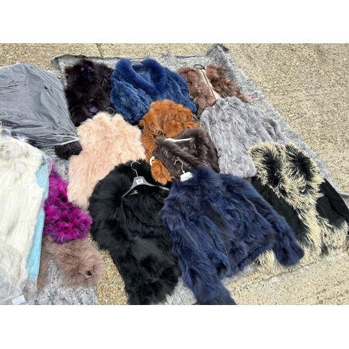 249 - A collection of 24 fur and faux fur jackets and coats