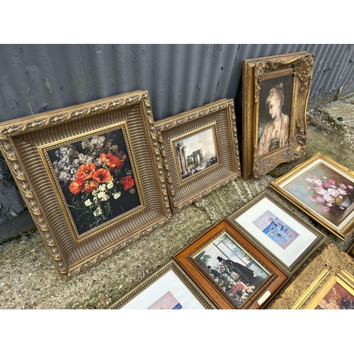 251 - A collection of 9 gold gilt framed reproduction prints and pictures