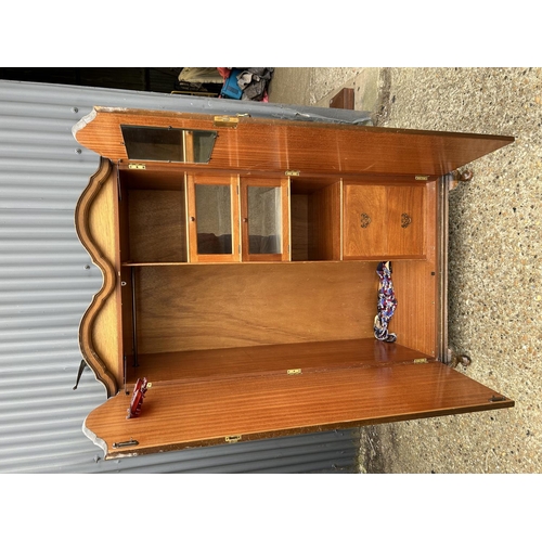 26 - A burr walnut gents wardrobe with double arch top and fitted interior 92x55x180