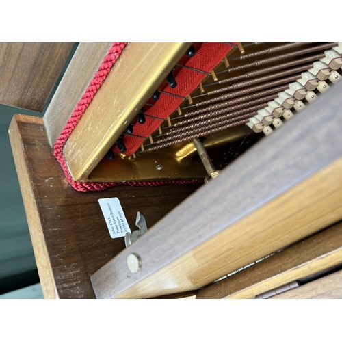 262 - A mid century teak cased upright piano by BARRET AND ROBINSON 134cm wide