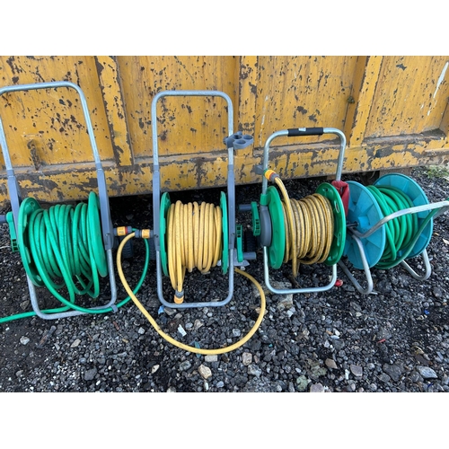 347 - Four hoses on reels