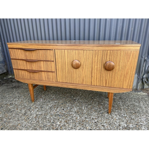 37 - A short retro sideboard 136cm