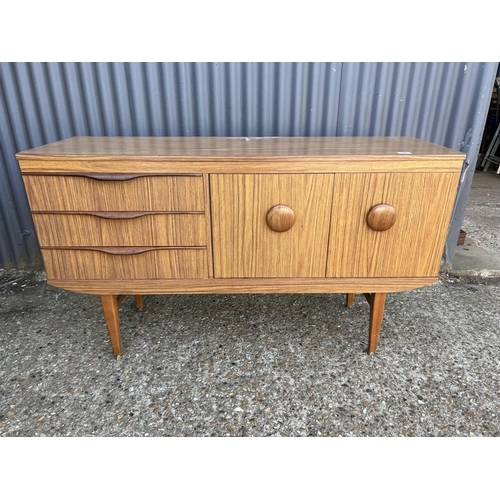 37 - A short retro sideboard 136cm