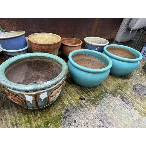 381 - Collection of 20 terracotta and large glazed pots