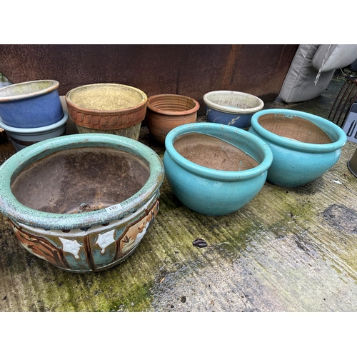 381 - Collection of 20 terracotta and large glazed pots