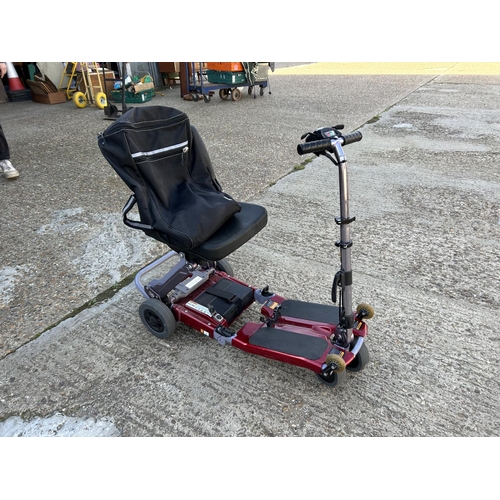 40 - A LUGGIE folding mobility scooter with charger (reported working)