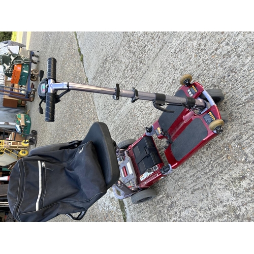 40 - A LUGGIE folding mobility scooter with charger (reported working)