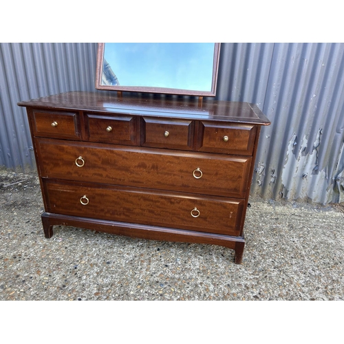 44 - A stag minstrel six drawer dressing chest