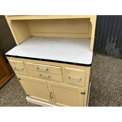 6 - A vintage yellow painted kitchen cabinet / dresser with enamel surface 92x55x185