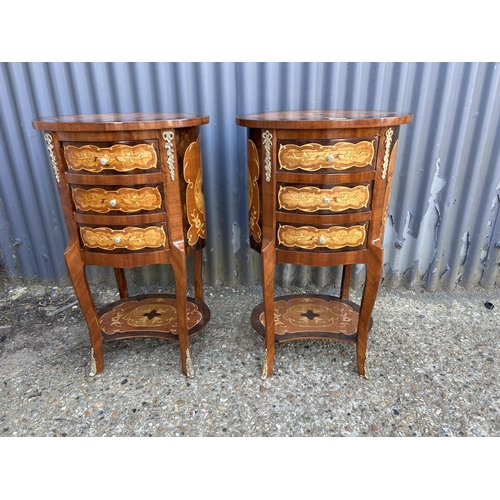 60 - A pair of Italian style inlaid and gold gilt three drawer bedsides