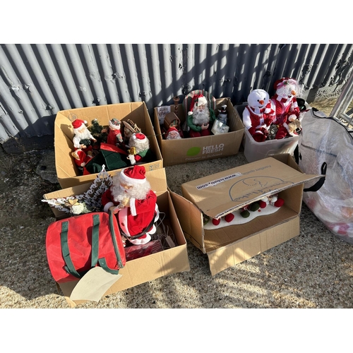 69 - Six boxes and a large bag of Xmas figures, santas, snowmen and novelty's