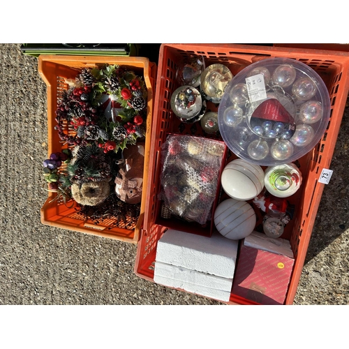 73 - Five plastic crates of assorted Xmas decorations