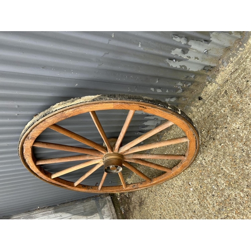 8 - A very large decorative wagon wheel 145cm diameter