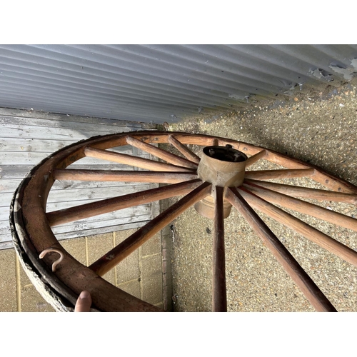 8 - A very large decorative wagon wheel 145cm diameter