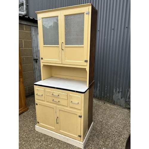 6 - A vintage yellow painted kitchen cabinet / dresser with enamel surface 92x55x185