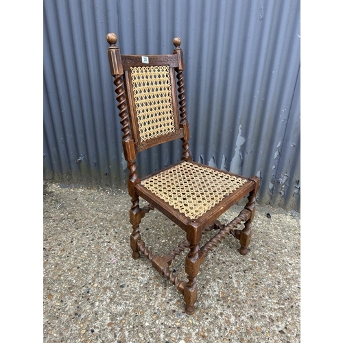 23 - A begere and barley twist chair