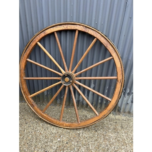 8 - A very large decorative wagon wheel 145cm diameter