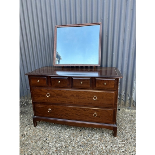 44 - A stag minstrel six drawer dressing chest