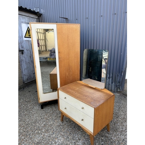 57 - A g plan mid century light oak bedroom pair consisting of wardrobe and two drawer dressing chest