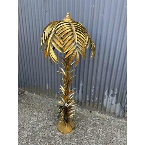 59 - A floor standing palm tree standard lamp