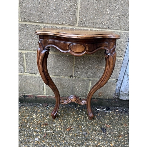 170 - An ornate mahogany hall table