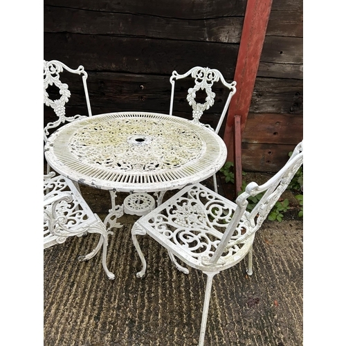 363 - White painted aluminium garden table and 4 chairs, 80 cms diameter