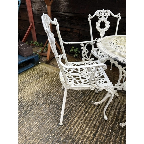 363 - White painted aluminium garden table and 4 chairs, 80 cms diameter